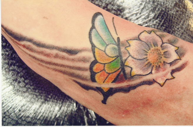Looking for unique  Tattoos? Butterfly And Flower on foot